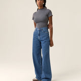 Calça Jeans Wide Leg Buriti Azul Médio Eco Denim™. Compre online moda sustentável e atemporal na Minimadeia. Roupas femininas estilosas, básicas e sustentáveis. Foto produto 06