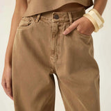 Calça Jeans Wide Leg Buriti Marrom Claro Eco Denim™. Compre online moda sustentável e atemporal na Minimadeia. Roupas femininas estilosas, básicas e sustentáveis. Foto produto ABR25 05