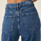 Calça Jeans Slouchy Cacau Azul Médio Eco Denim™. Compre online moda sustentável e atemporal na Minimadeia. Roupas femininas estilosas, básicas e sustentáveis. Foto produto ABR25 06