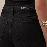 Calça Jeans Slouchy Cacau Preta Eco Denim™. Compre online moda sustentável e atemporal na Minimadeia, marca slow fashion de roupas femininas. Foto produto MAR26 07