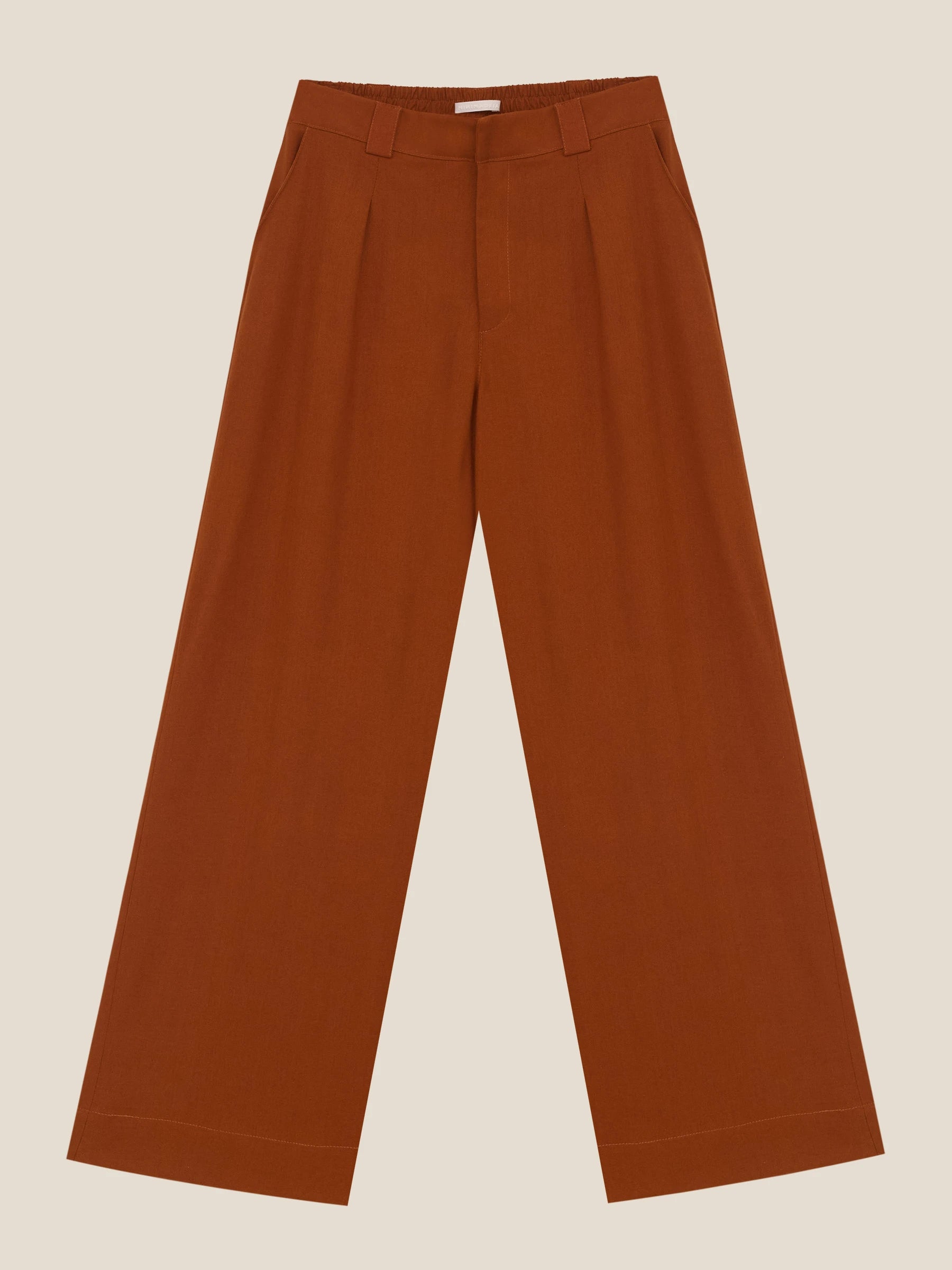 Calça Pantalona de Alfaiataria em Linho e Viscose FSC™ Graviola Terracota. Compre online moda sustentável e atemporal na Minimadeia. Roupas femininas estilosas, básicas e sustentáveis. Foto produto still 01